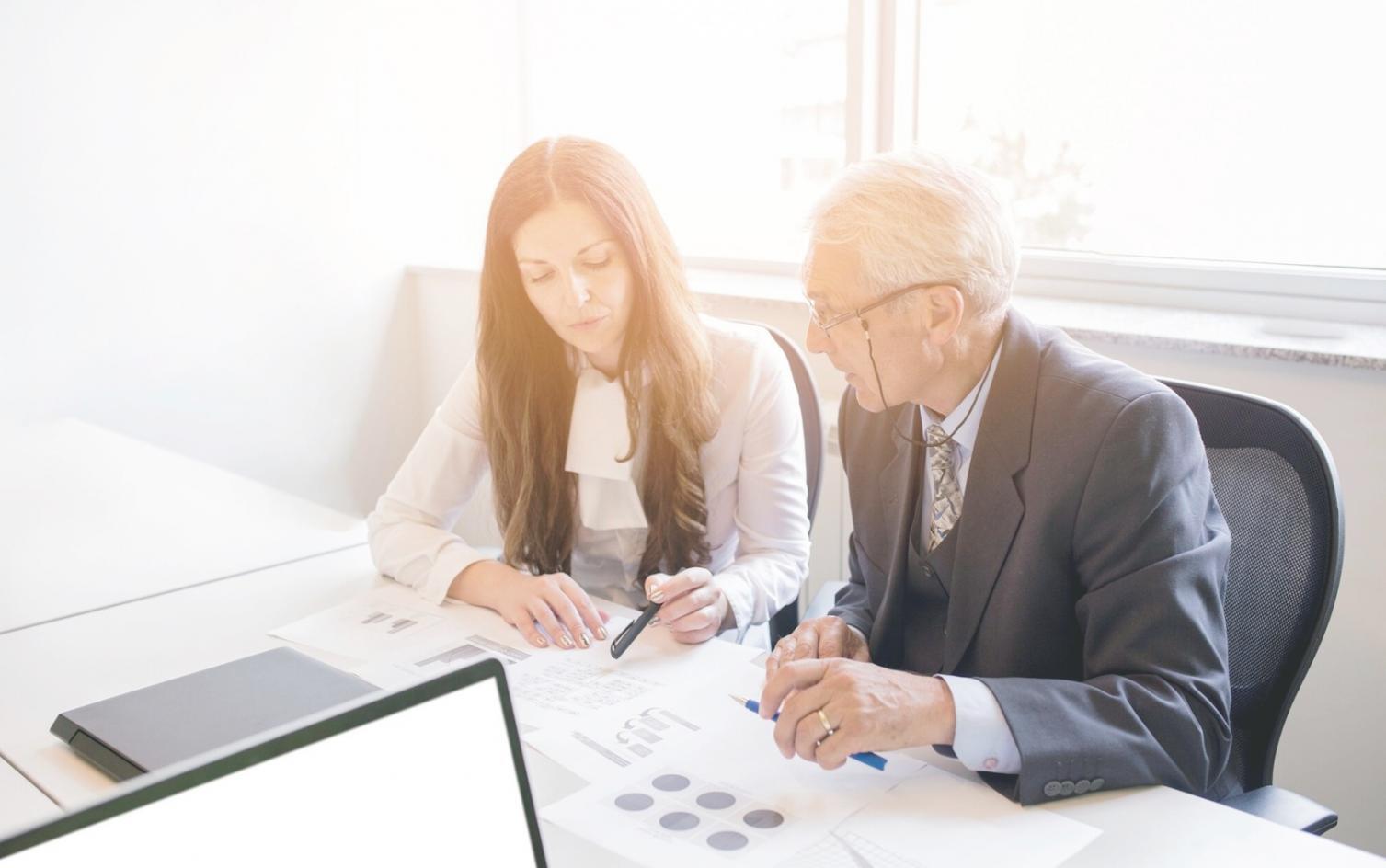 Professional financial negotiation training session with Indonesian business professionals learning practical techniques